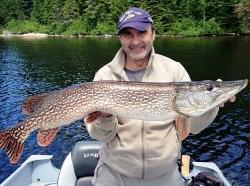 135_russ_pottinger_with_a_large_pike_2015_10_01_2017_7_24_01.jpg